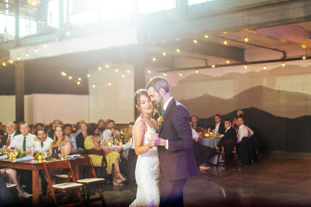 A newlywed couple during their first dance 