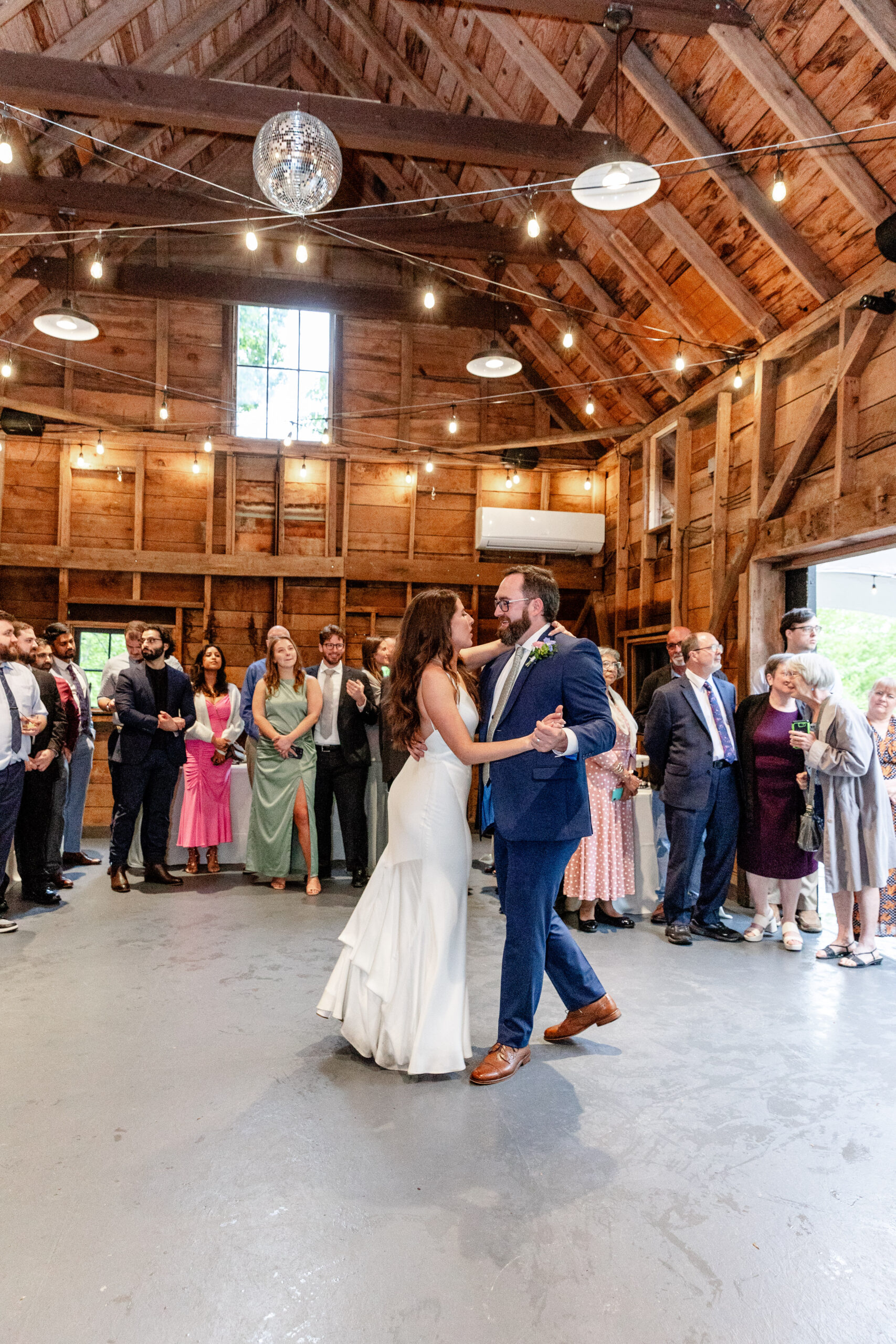 bride and groom dancing inside laurel falls wedding venue