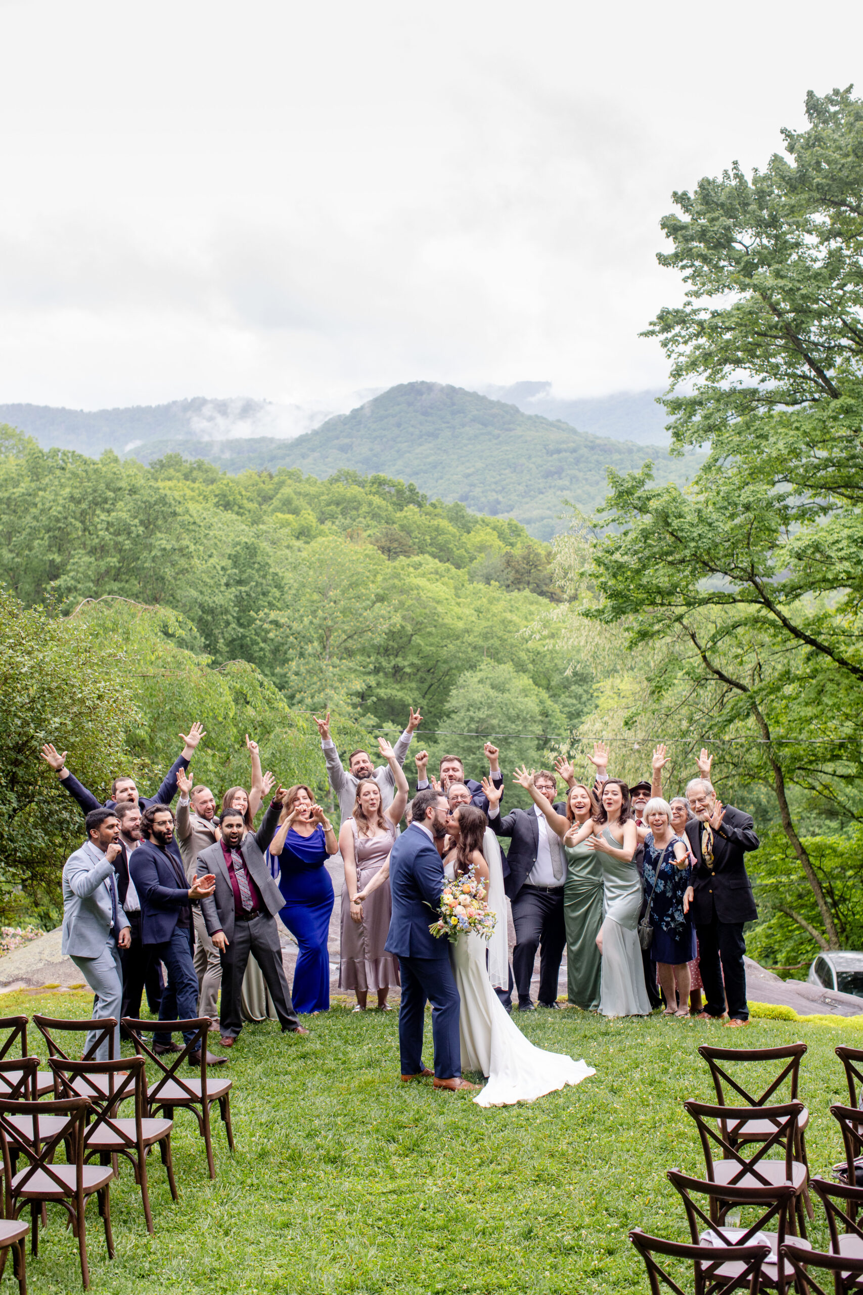 ceremony guests celebrating the wedding of the bride and groom