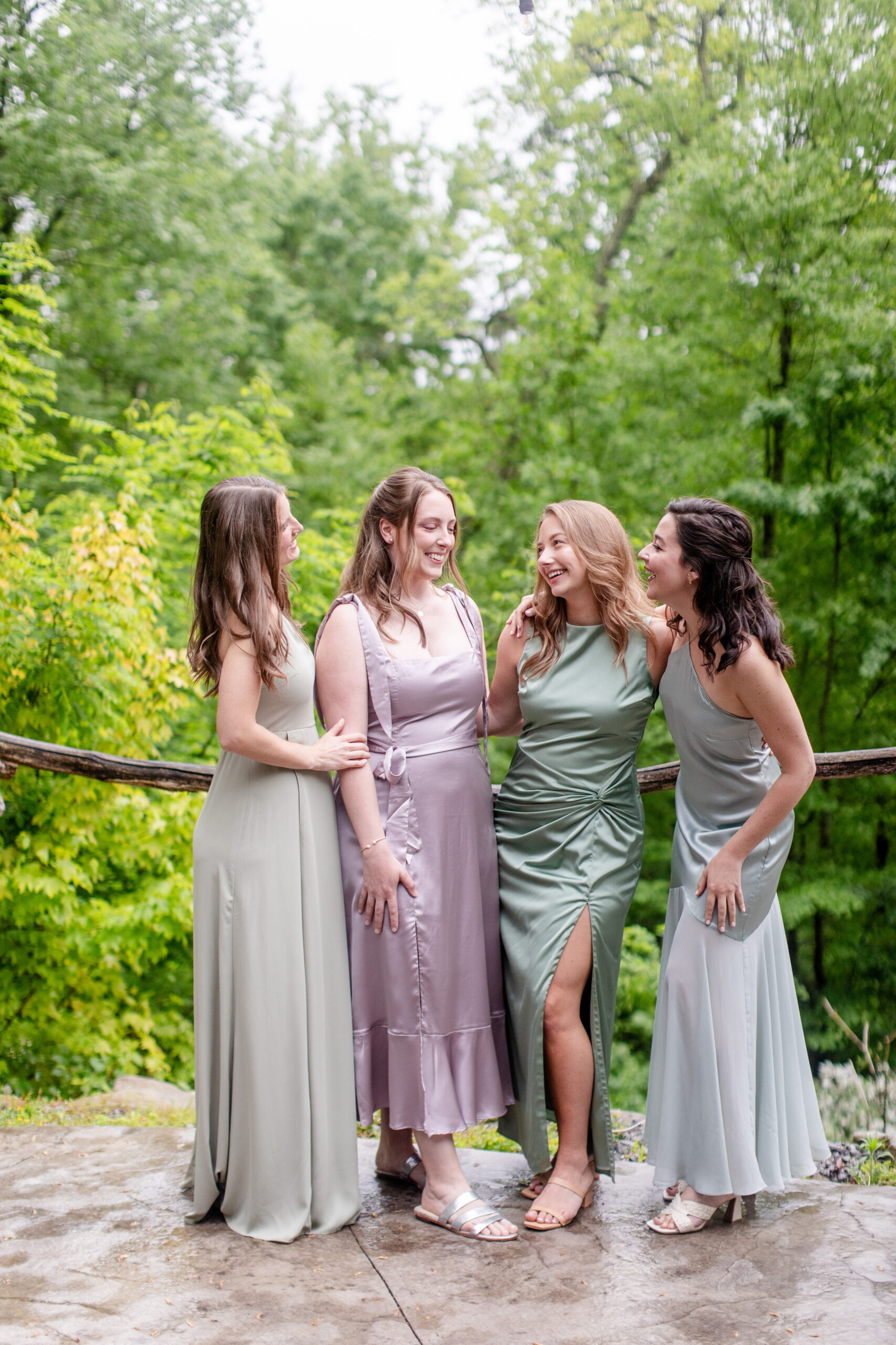 bridesmaids standing together laughing