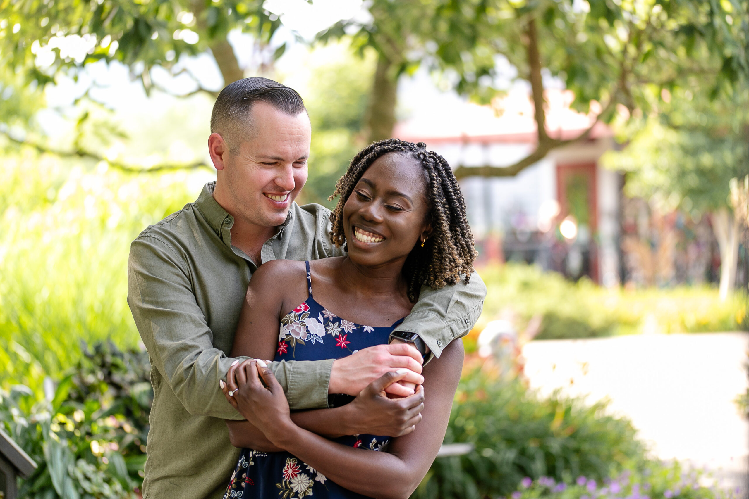 a man and woman laughing together 