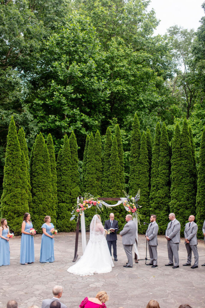 View looking down at a wedding ceremony in progress 
