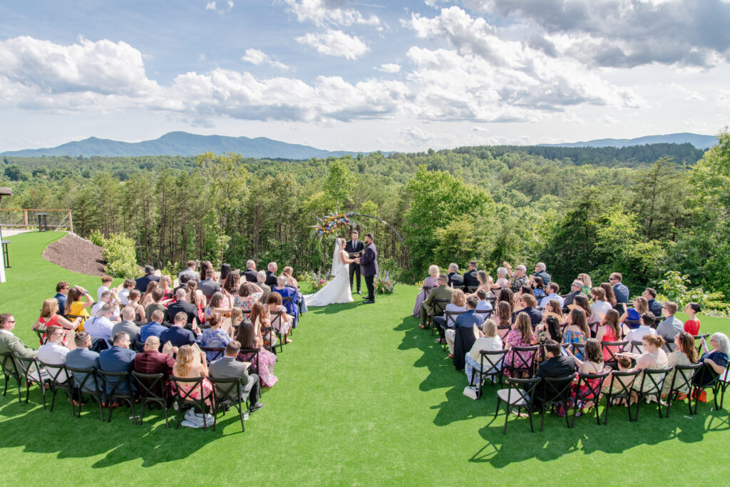 outdoor wedding ceremony with Blue Ridge Mountain views at an Asheville NC wedding venue