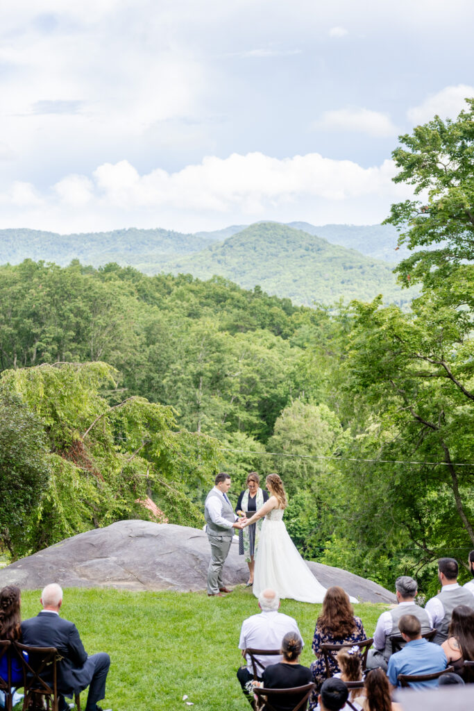 Laurel Falls wedding venue wedding couple in Asheville, North Carolina with Blue Ridge Mountains wedding backdrop 