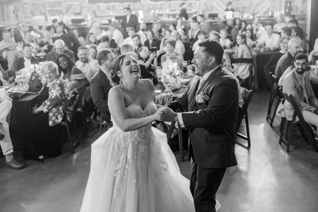 black and white first dance at Highland Brewing Company wedding reception in Asheville NC